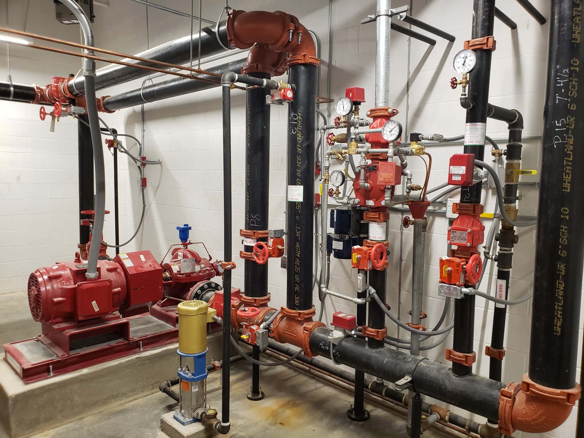 Fire Sprinkler pump and riser room at new Ramsey Solutions Headquarters